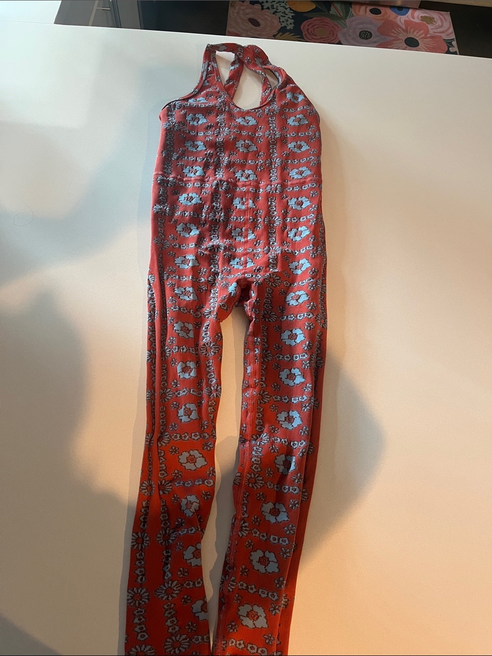 FP Movement One piece, floral print Orange/red  with blue flowers